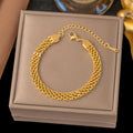 Pulsera trenzada de acero inoxidable hecha de acero de titanio.